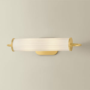 Close-up of the Elaine Picture Light in aged brass showing the arm curve and shade proportion.