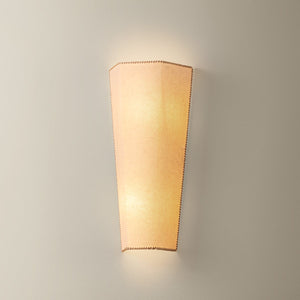 Celmins Wall Sconce 7.5" shown from a second angle to highlight the arm curve and shade silhouette.