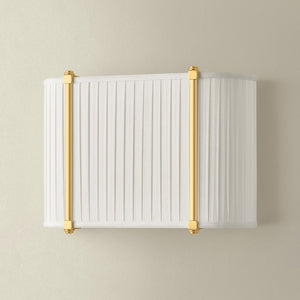 Cornell Wall Sconce 12" in aged brass shown from a second angle to highlight the arm curve and shade silhouette.