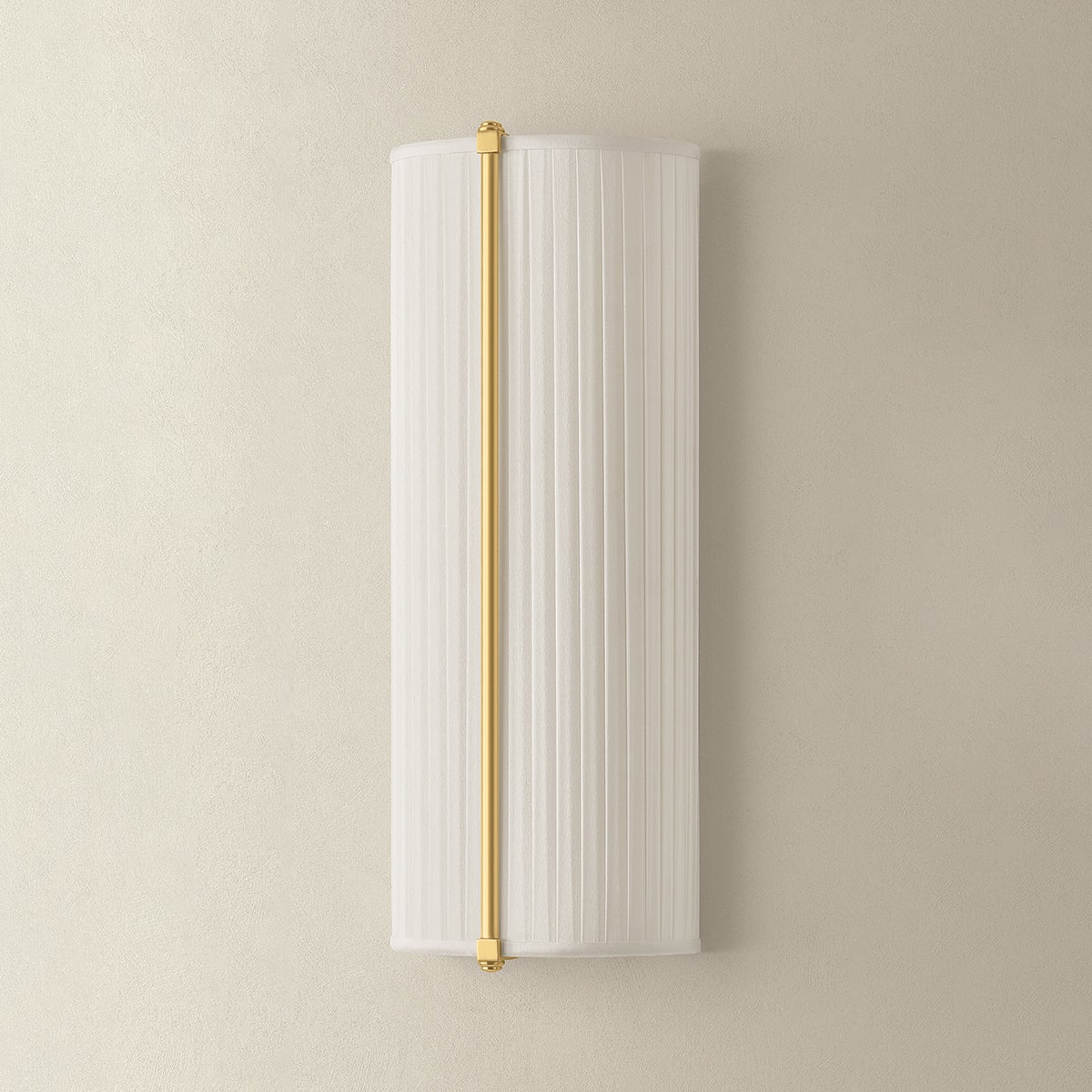 Cornell Wall Sconce 6.5" in aged brass shown from a second angle to highlight the arm curve and shade silhouette.