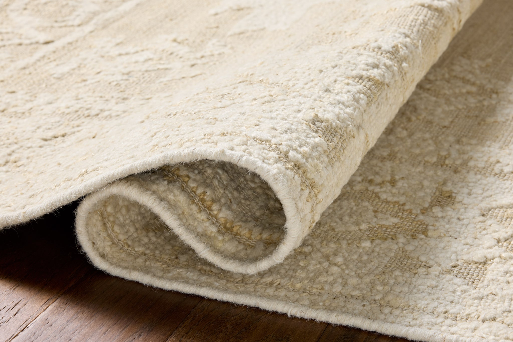 Alara Ivory / Natural (Pattern 1) shown from a different angle to reveal its pattern.