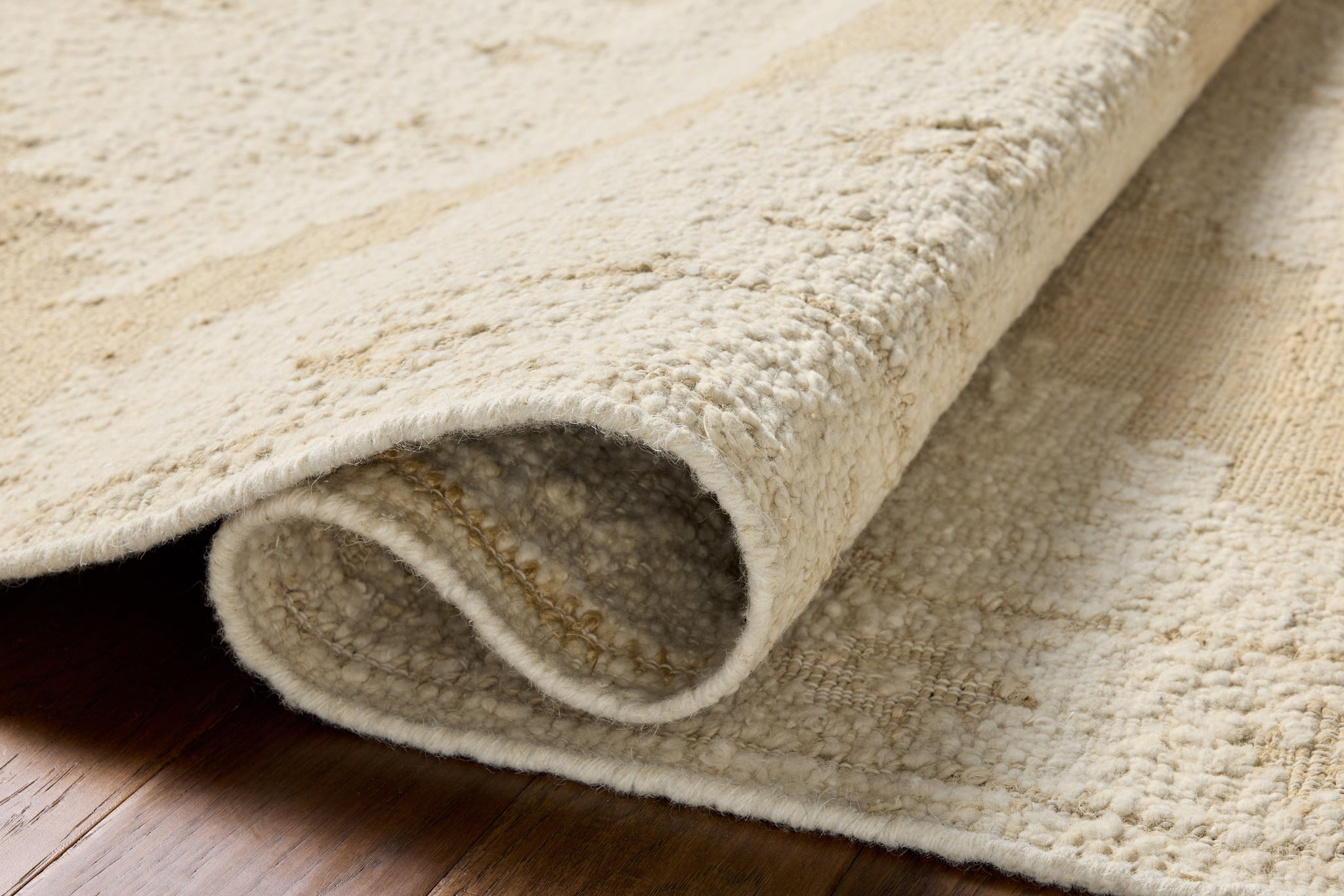 Alara Ivory / Natural (Pattern 3) shown from a different angle to reveal its pattern.
