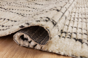 Alice Cream / Charcoal by Chris Loves Julia x Loloi (Pattern 1) styled in a living room at Laurie Yapp Home.