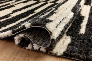Close-up detail of the Alice Cream / Charcoal by Chris Loves Julia x Loloi (Pattern 3) showing its pile and weave.