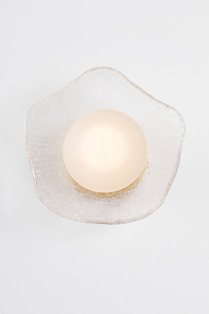 Close-up of the Almandine Wall Sconce showing the arm curve and shade silhouette.