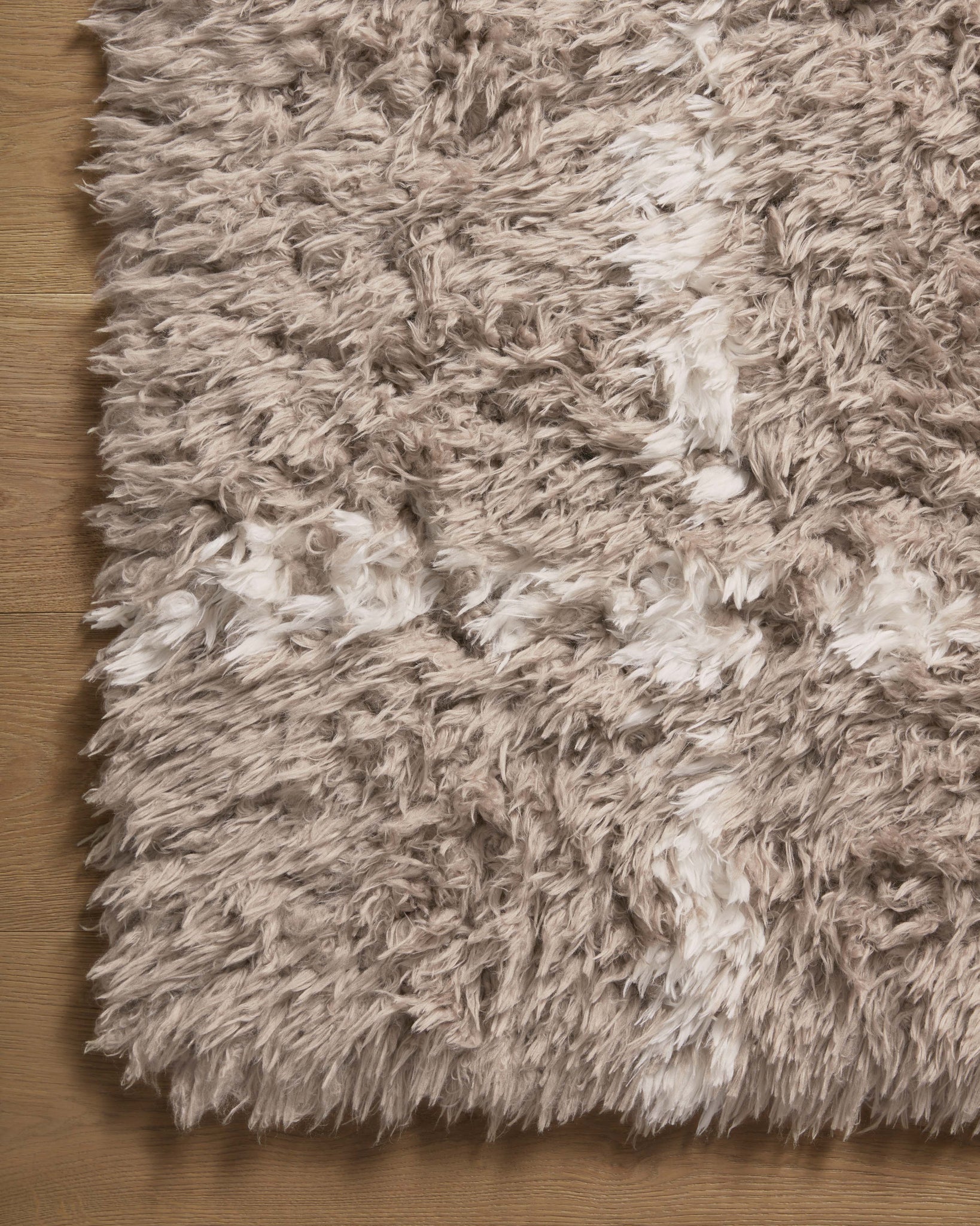 Amira Khaki / Ivory shown from a different angle to reveal its pattern.