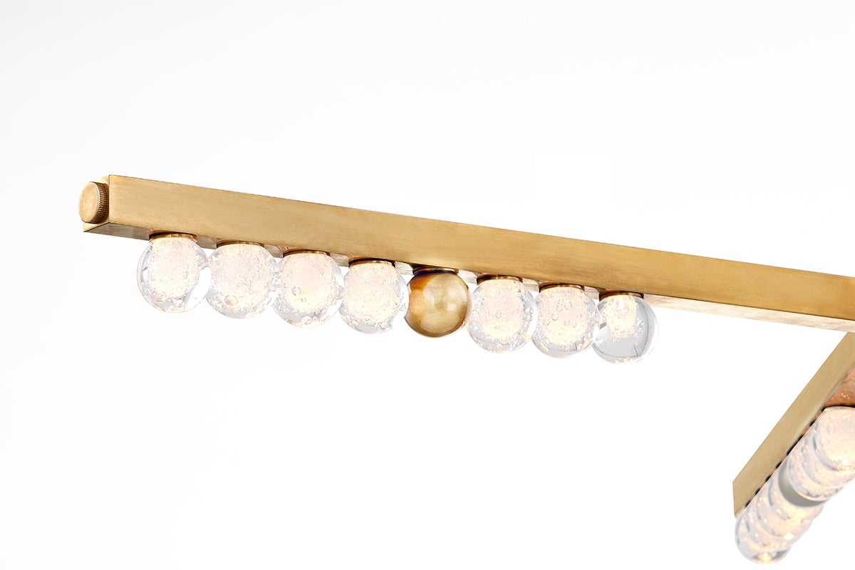 Annecy Chandelier shown from the front to reveal the frame, arms, and shade detail.