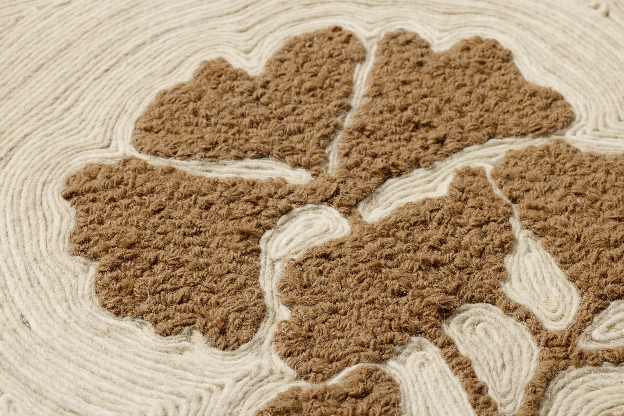 Clover & Clay Brown Rug Art shown from a different angle to reveal its pattern.