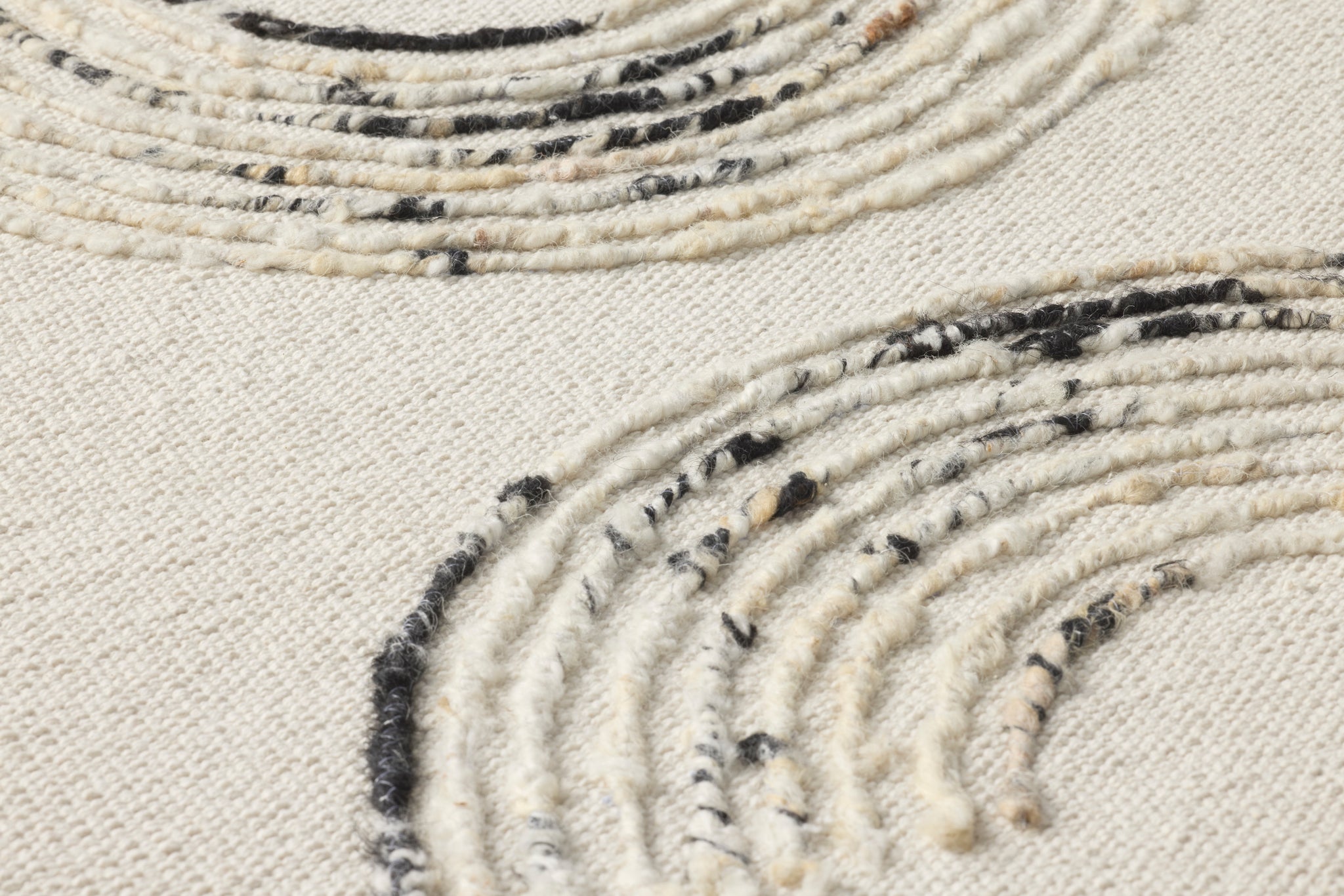 Verse Ivory / Black shown from a different angle to reveal its pattern.