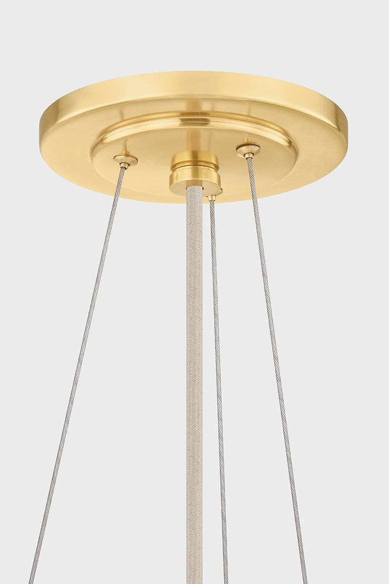 Ashland Pendant 22" in aged brass shown from a second angle to highlight the shade shape and metal detail.