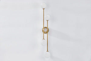 Astro Wall Sconce shown from a second angle to highlight the arm curve and shade silhouette.