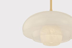 Close-up of the Auburndale Pendant in aged brass showing the shade shape and metal detail.