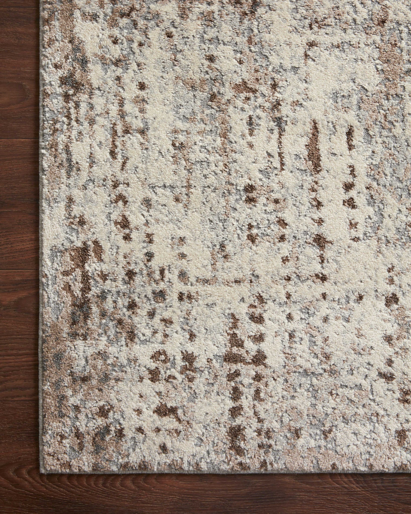 Austen Natural / Mocha (Pattern 1) shown in a curated living room setting at Laurie Yapp Home.