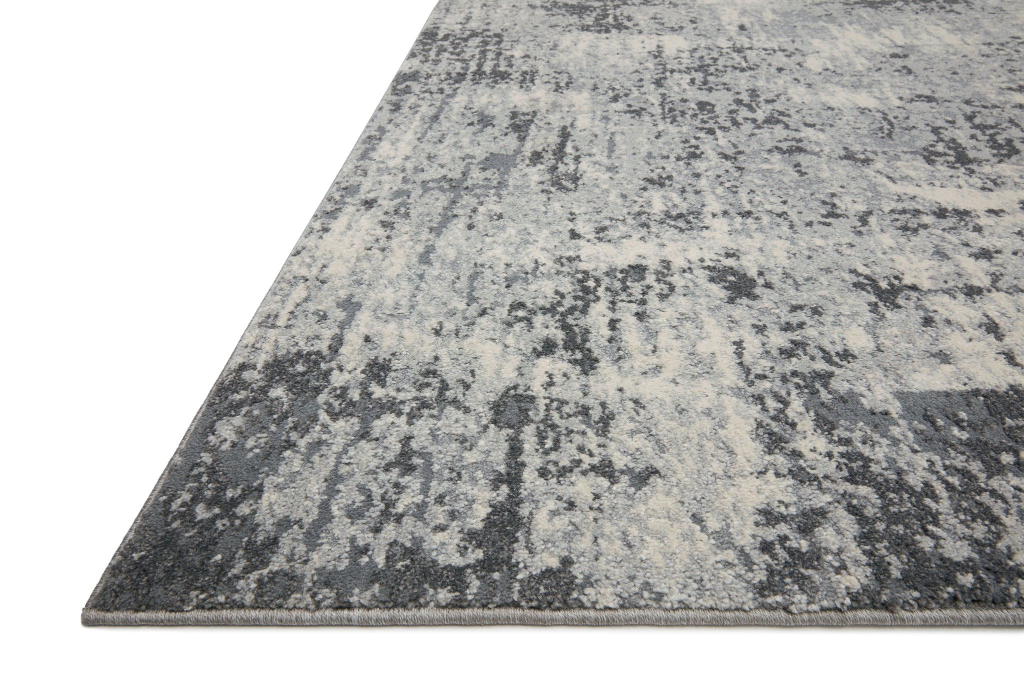 Side view of the Austen Pebble / Charcoal (Pattern 1) rug.