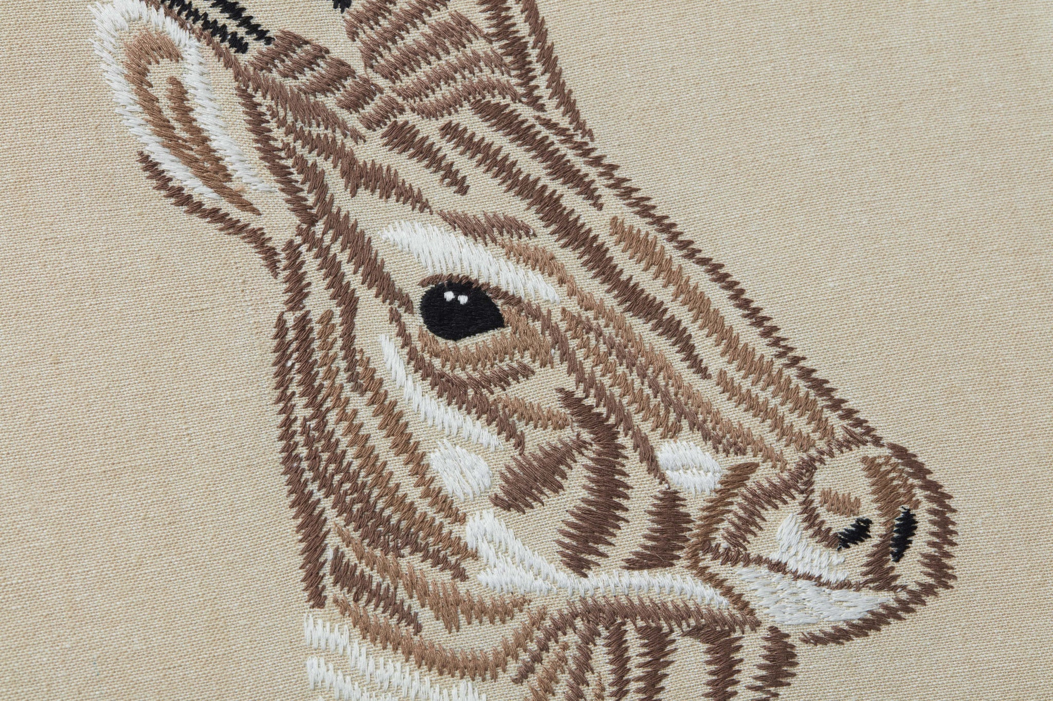 Saola Beige / Ivory shown from a different angle to reveal its pattern.