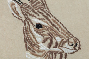 Saola Beige / Ivory shown from a different angle to reveal its pattern.