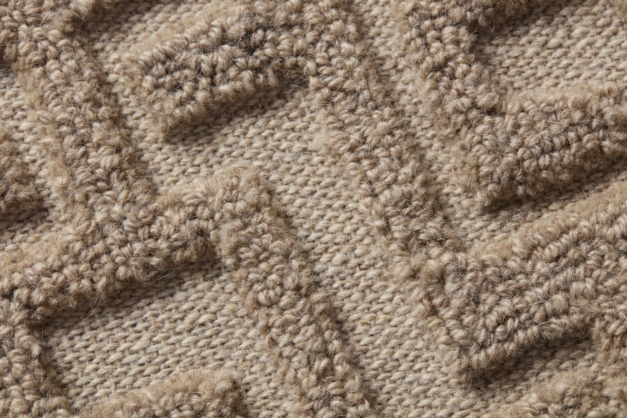 Mythus Beige / Ivory Rug Art shown from a different angle to reveal its pattern.