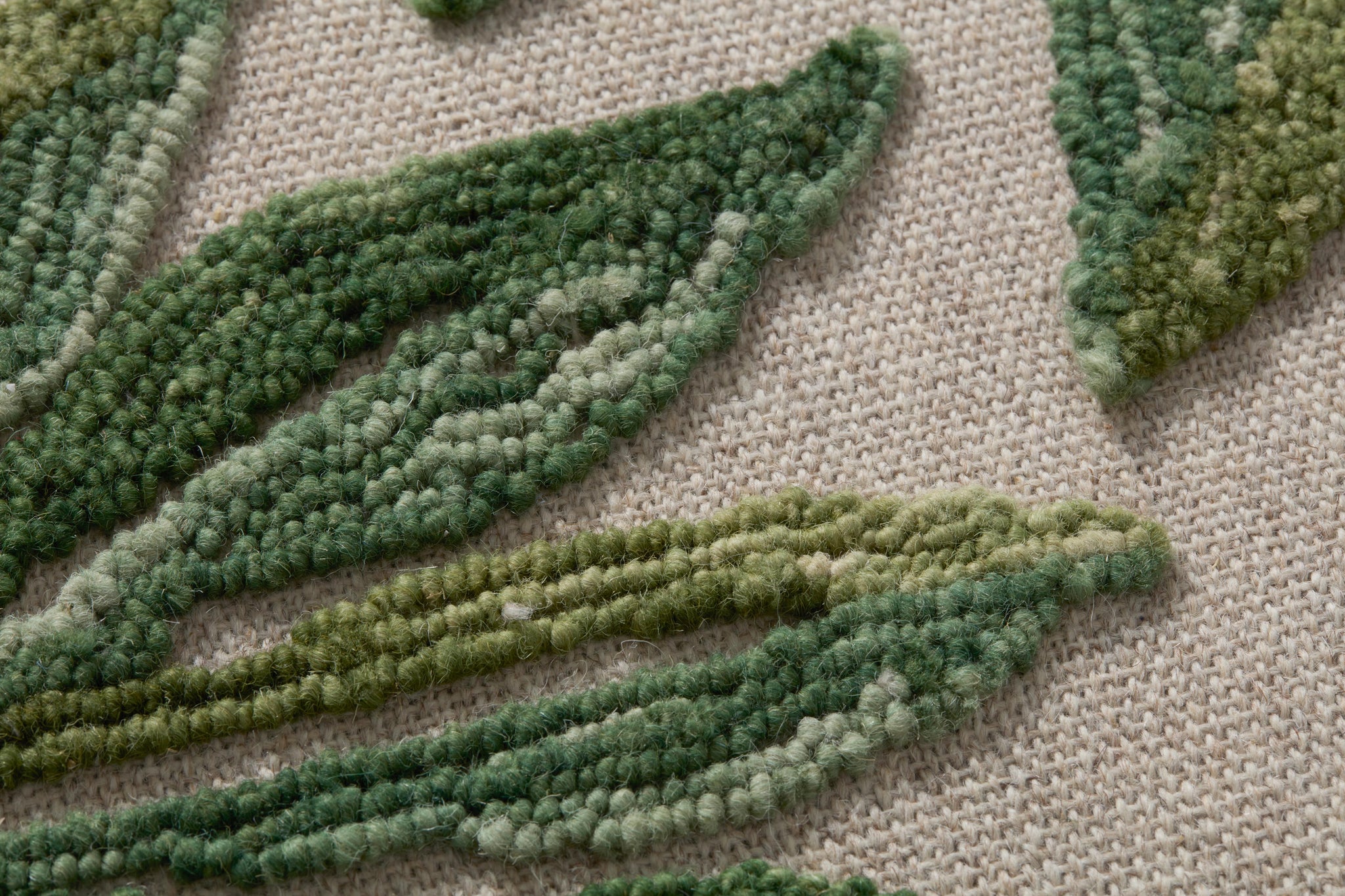 Wallacea Green / Ivory shown from a different angle to reveal its pattern.