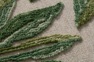 Wallacea Green / Ivory shown from a different angle to reveal its pattern.