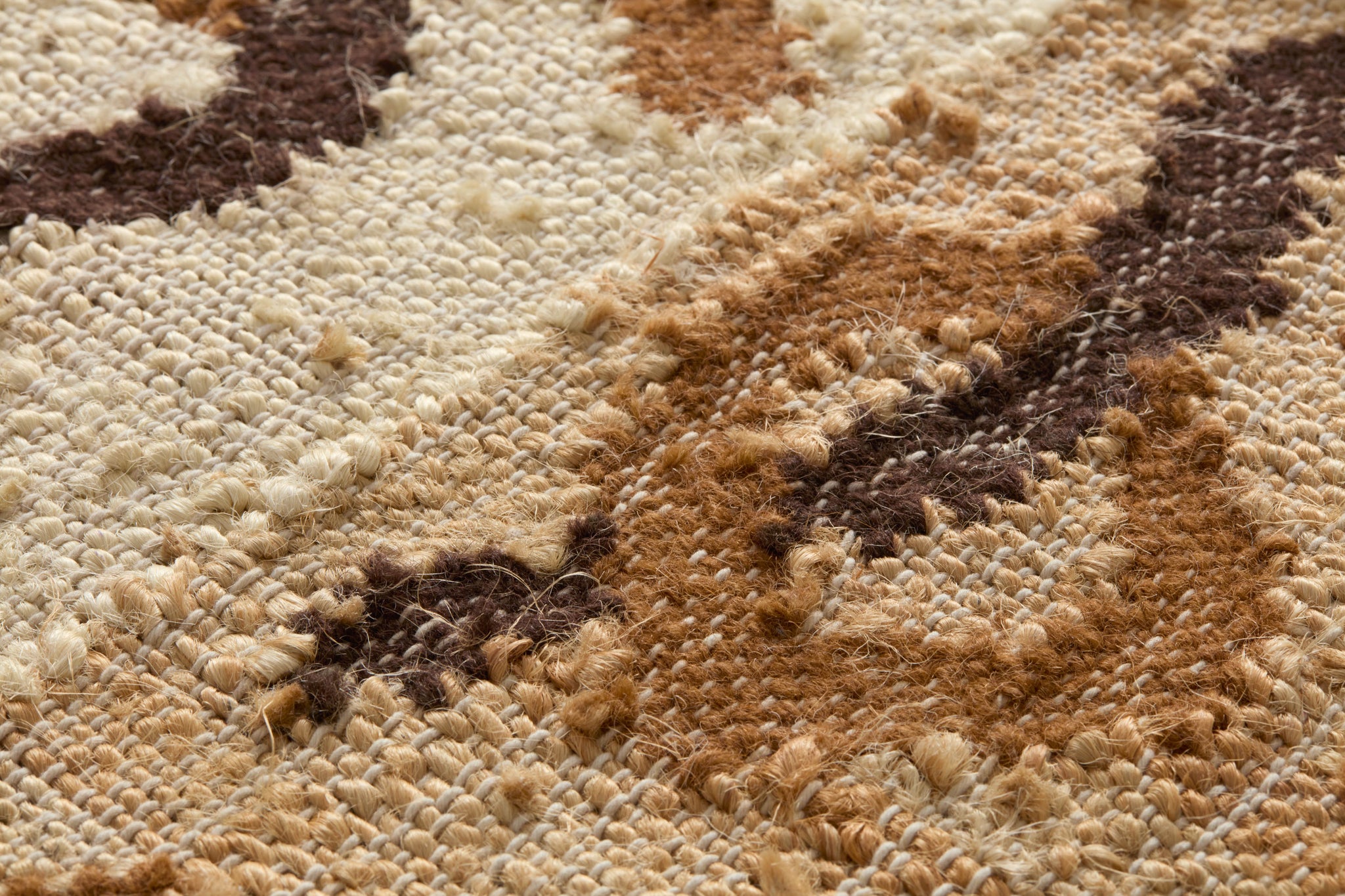 Grand Bara Beige / Brown Rug Art shown from a different angle to reveal its pattern.