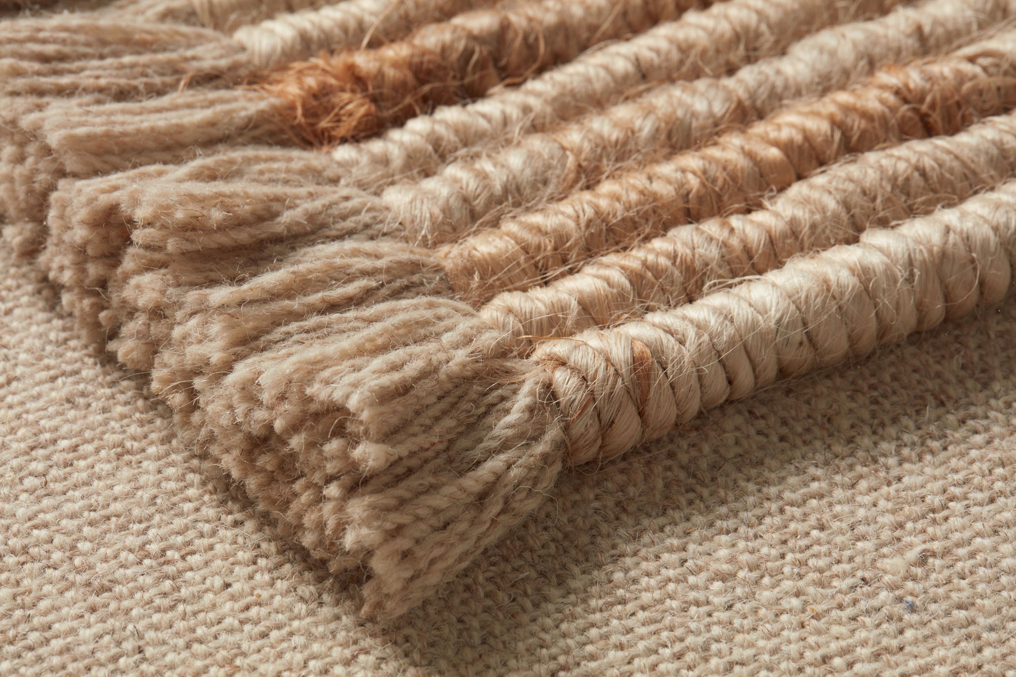 Wholesome Beige / Ivory Rug Art shown from a different angle to reveal its pattern.
