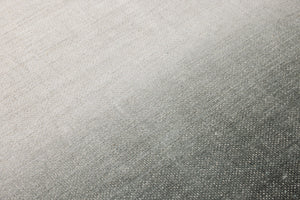 Plutus Green / Beige Rug Art shown from a different angle to reveal its pattern.