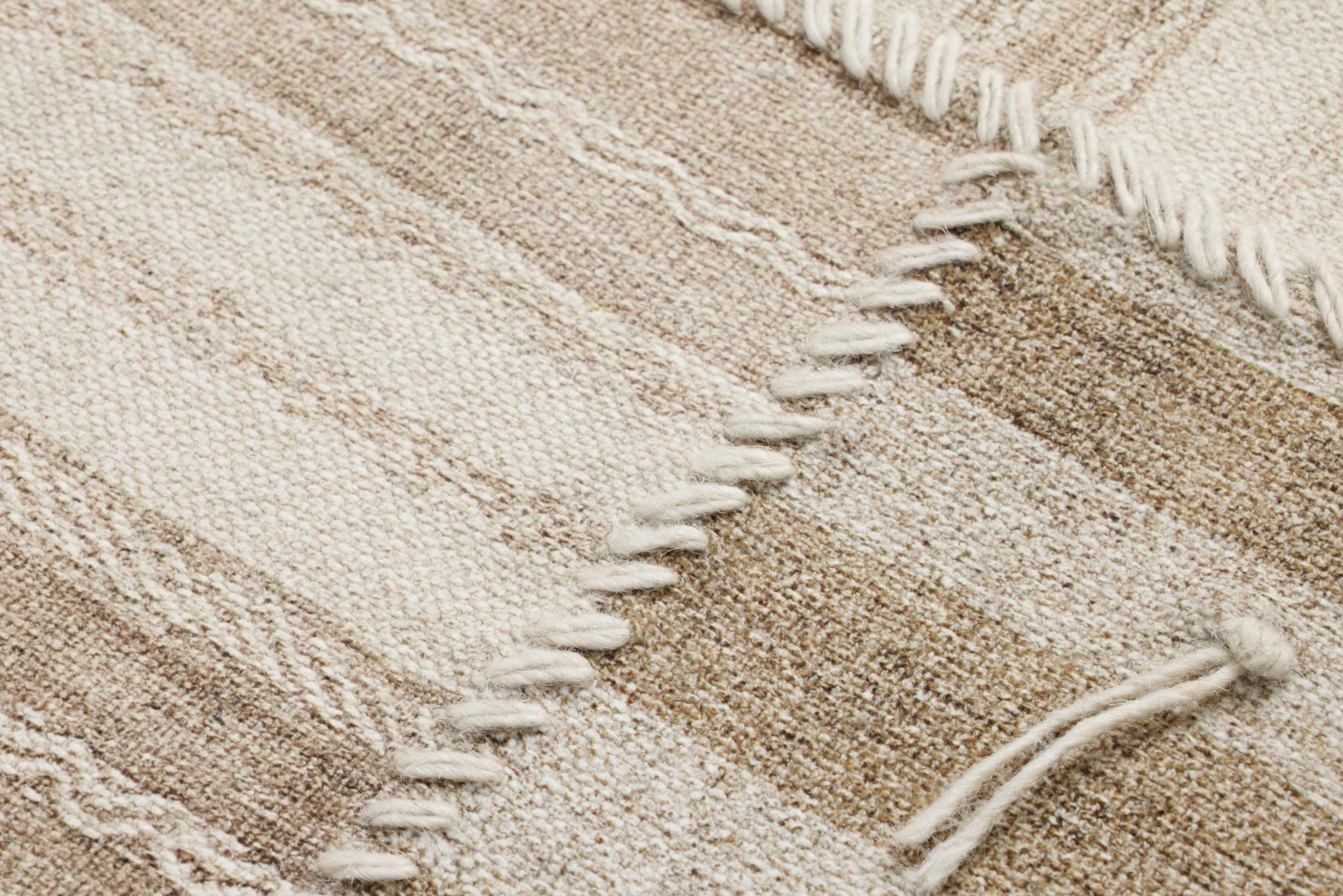 Patchwork B Beige / Brown Rug Art shown from a different angle to reveal its pattern.