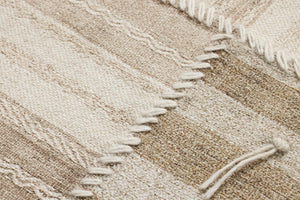 Patchwork B Beige / Brown Rug Art shown from a different angle to reveal its pattern.