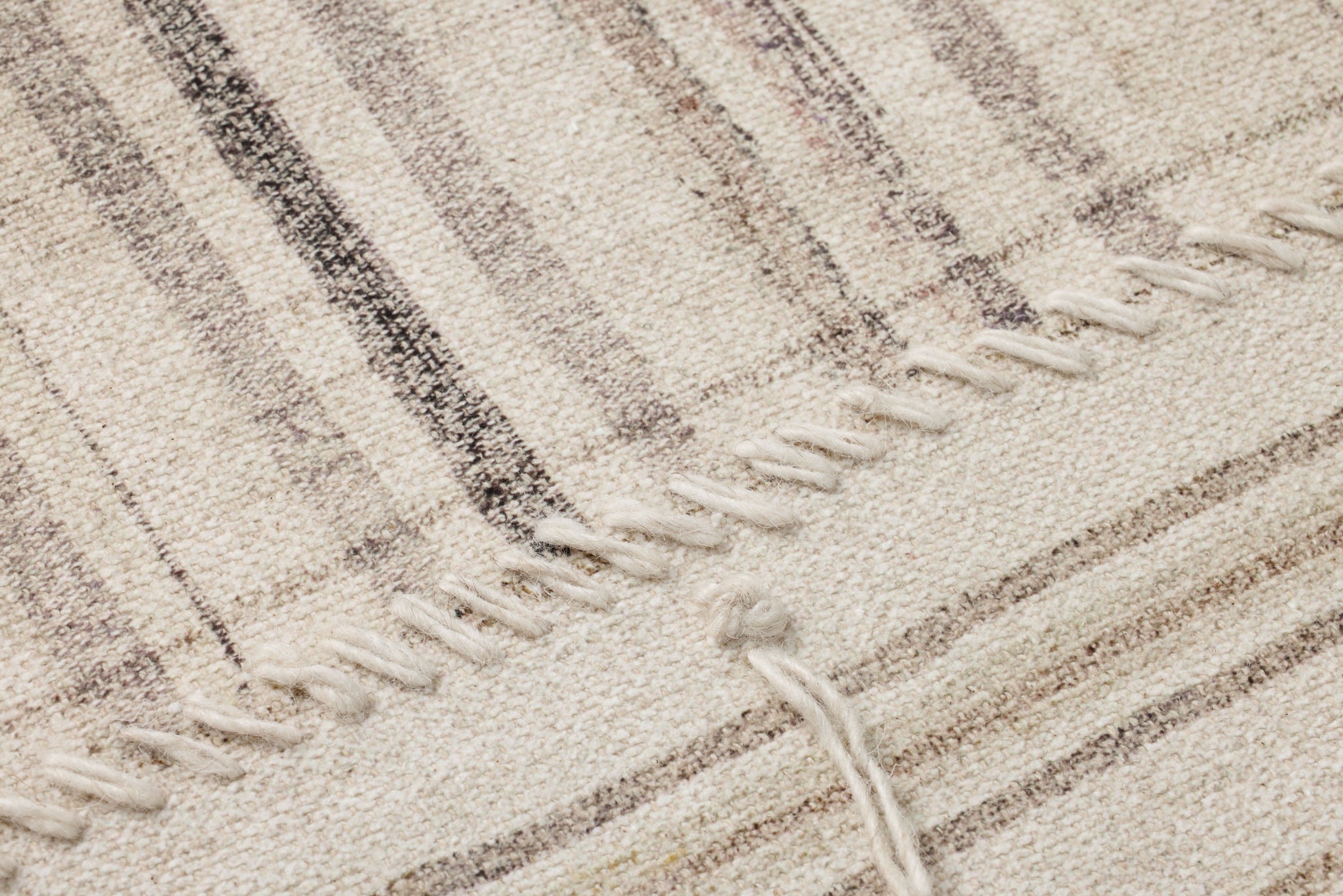 Patchwork C Beige / Brown Rug Art shown from a different angle to reveal its pattern.