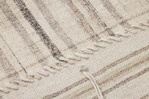 Patchwork C Beige / Brown Rug Art shown from a different angle to reveal its pattern.