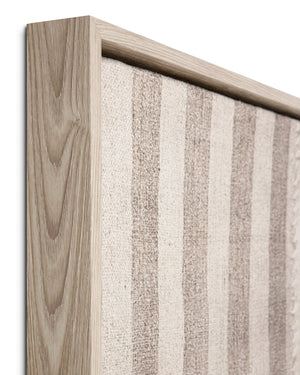 Pieced Work Beige / Brown Rug Art shown from a different angle to reveal its pattern.