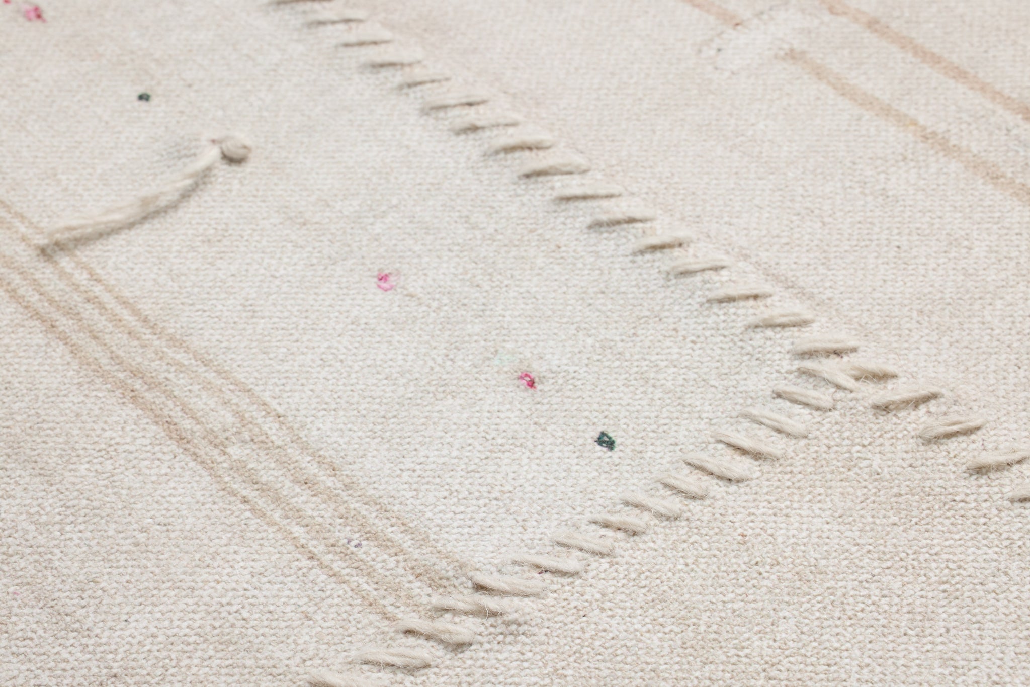 Rejuvinated Beige / Brown Rug Art shown from a different angle to reveal its pattern.