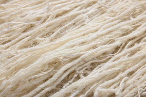 Piccolo Beige / Blue Rug Art shown from a different angle to reveal its pattern.