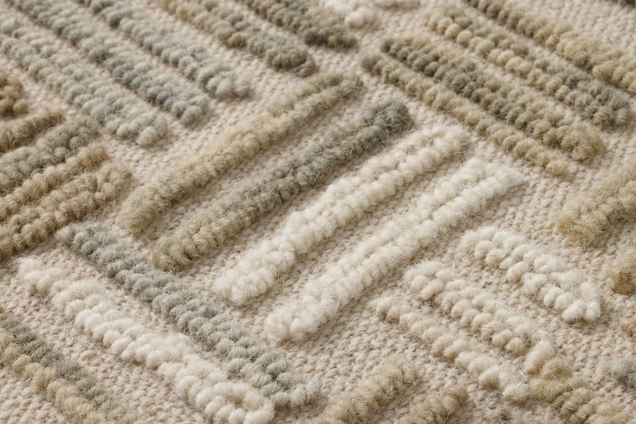 Perplexed Green / Ivory Rug Art shown from a different angle to reveal its pattern.