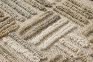 Perplexed Green / Ivory Rug Art shown from a different angle to reveal its pattern.