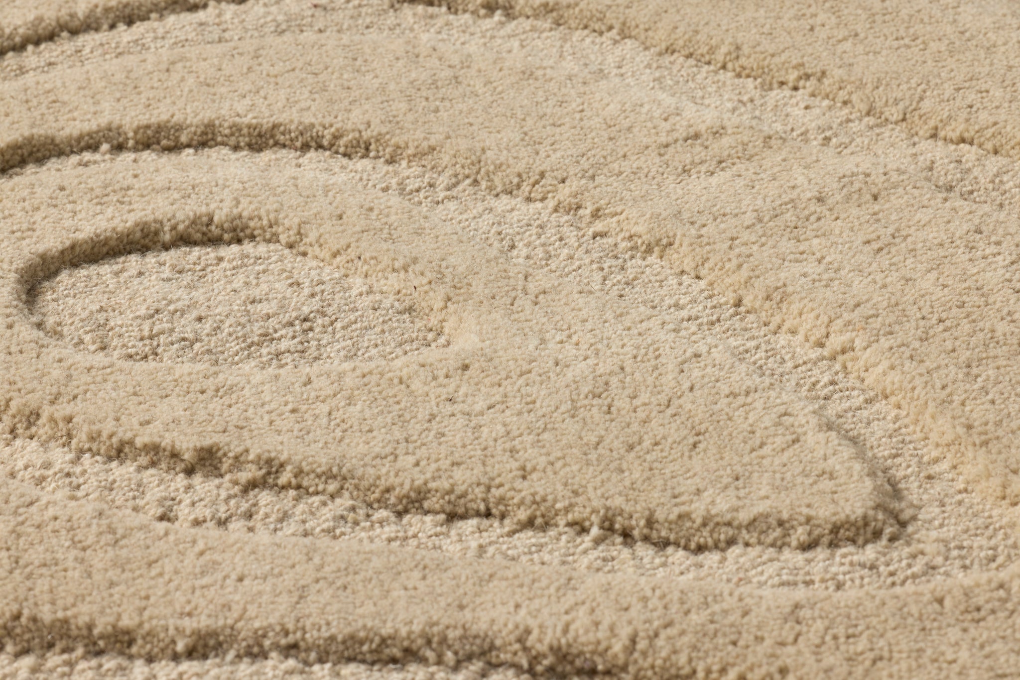 Oyster Of My Eye Beige / Beige Rug Art shown from a different angle to reveal its pattern.