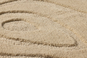 Oyster Of My Eye Beige / Beige Rug Art shown from a different angle to reveal its pattern.