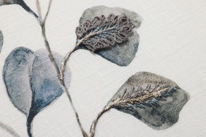 Dancing Flora Dk. Grey Rug Art shown from a different angle to reveal its pattern.