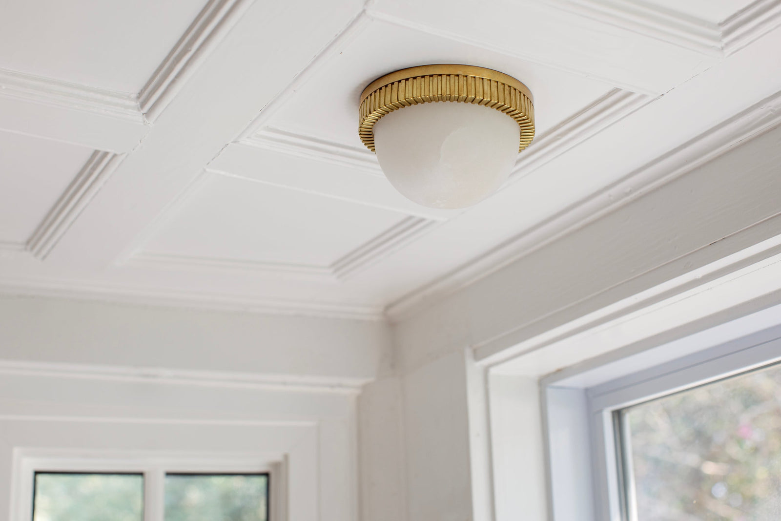 Ainsley Flush Mount in aged brass — a Hudson Valley flush mount for hallways, bedrooms, and entryways at Laurie Yapp Home.