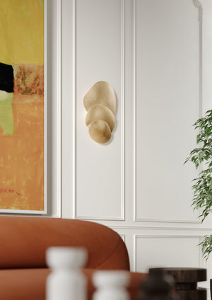 Akemi Wall Sconce styled in a modern bathroom for warm, layered light at Laurie Yapp Home.