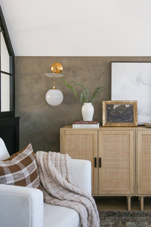 Antoinette Wall Sconce styled in a warmly lit hallway for warm, layered light at Laurie Yapp Home.