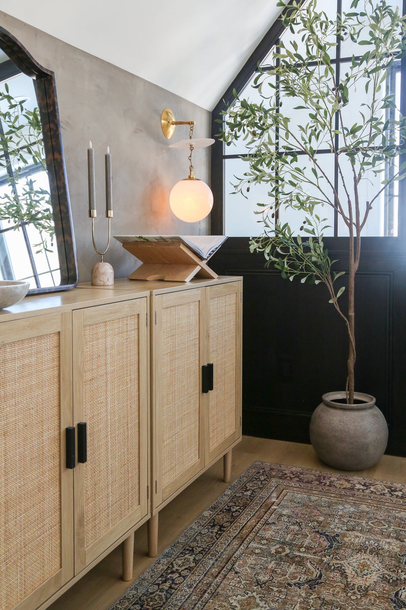 Antoinette Wall Sconce styled in a curated living room for warm, layered light at Laurie Yapp Home.