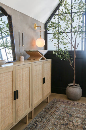 Antoinette Wall Sconce styled in a curated living room for warm, layered light at Laurie Yapp Home.
