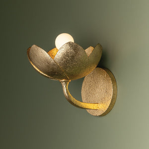 Arcata Wall Sconce styled in a warmly lit hallway for warm, layered light at Laurie Yapp Home.