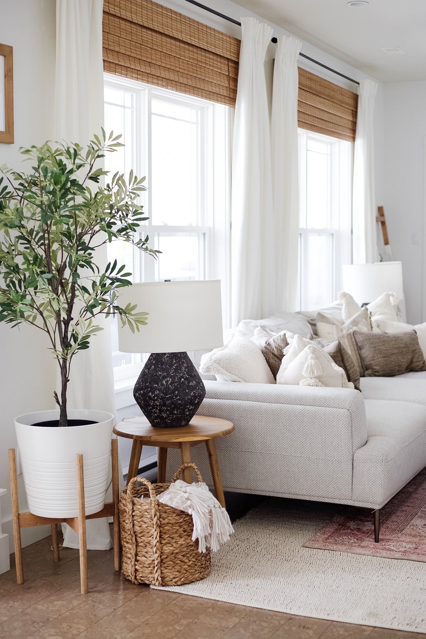 Artifact Table Lamp 16.75" styled in a living room side table for warm, layered light at Laurie Yapp Home.