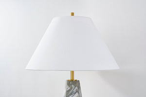 Benicia Table Lamp in aged brass shown from the front to reveal the base and shade proportions.