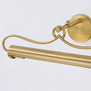 Close-up of the Berun Picture Light 20.5" in aged brass showing the arm curve and shade proportion.