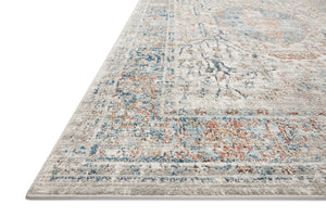Side view of the Bianca Stone / Multi rug.
