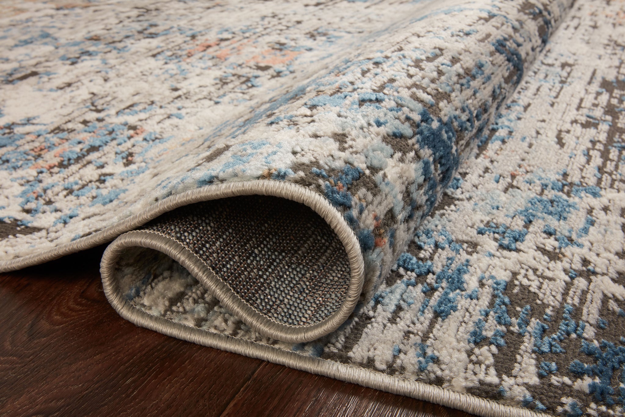 Close-up detail of the Bianca Granite / Multi showing its pile and weave.