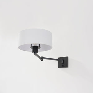 Close-up of the Sammy Wall Sconce in bronze showing the arm curve and shade silhouette.
